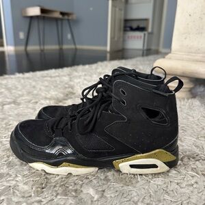 Jordan Black and Gold High-Top Sneakers with Air Unit